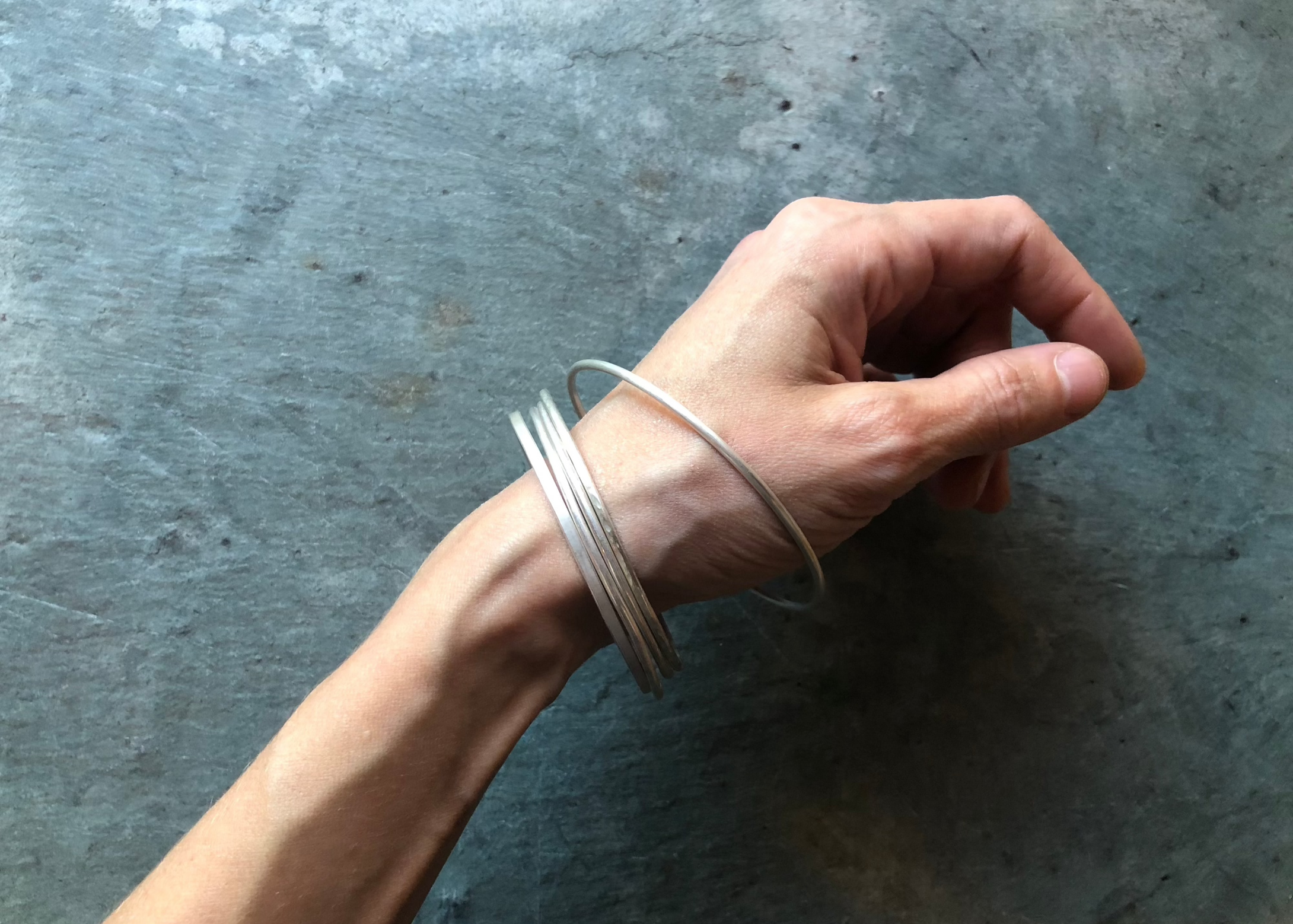 Silver Bangles | April 18 + 25 <br> Participants will texture, measure, saw, file, shape, solder, form, and polish a set of silver bangles that can be worn together or individually...